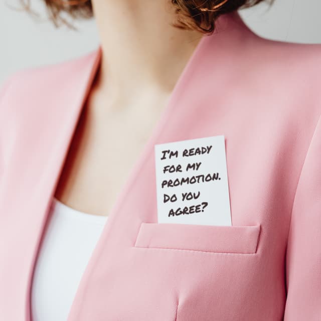 Woman wearing ping business jacket